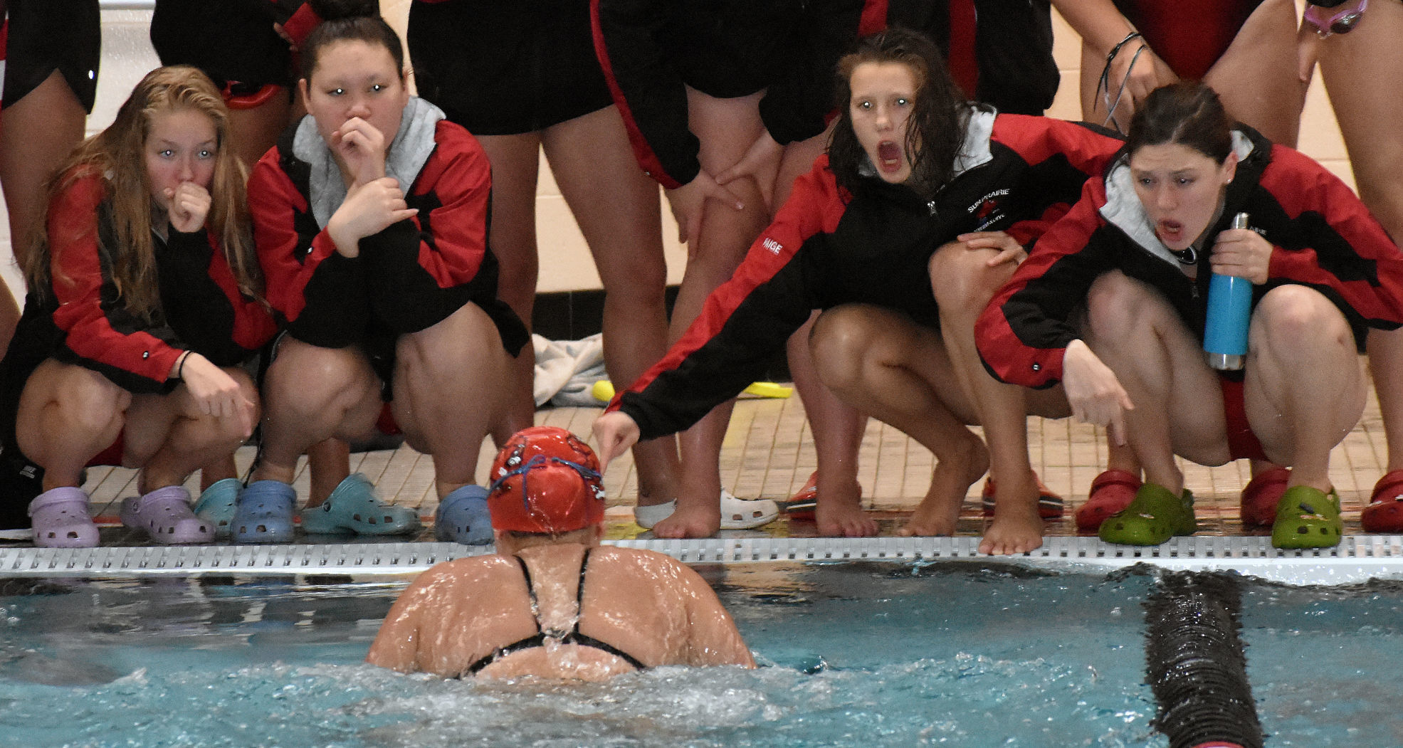 Prep girls swimming photo: Sun Prairie swimmers cheer on teammate Grace Sala